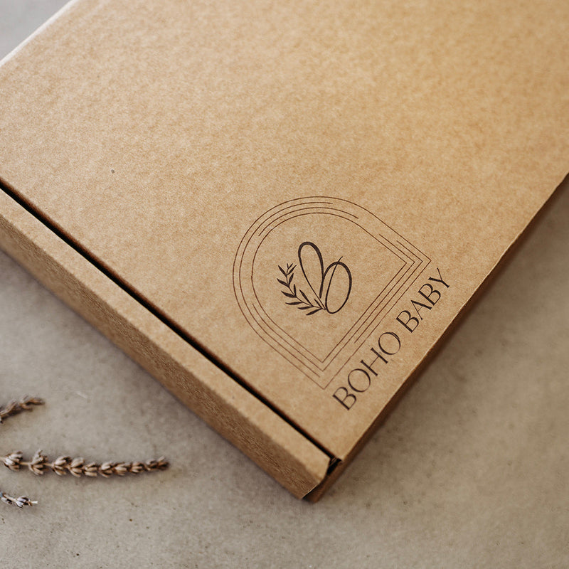 Brown Eco friendly packaging with 'Boho Baby' branding on a neutral background